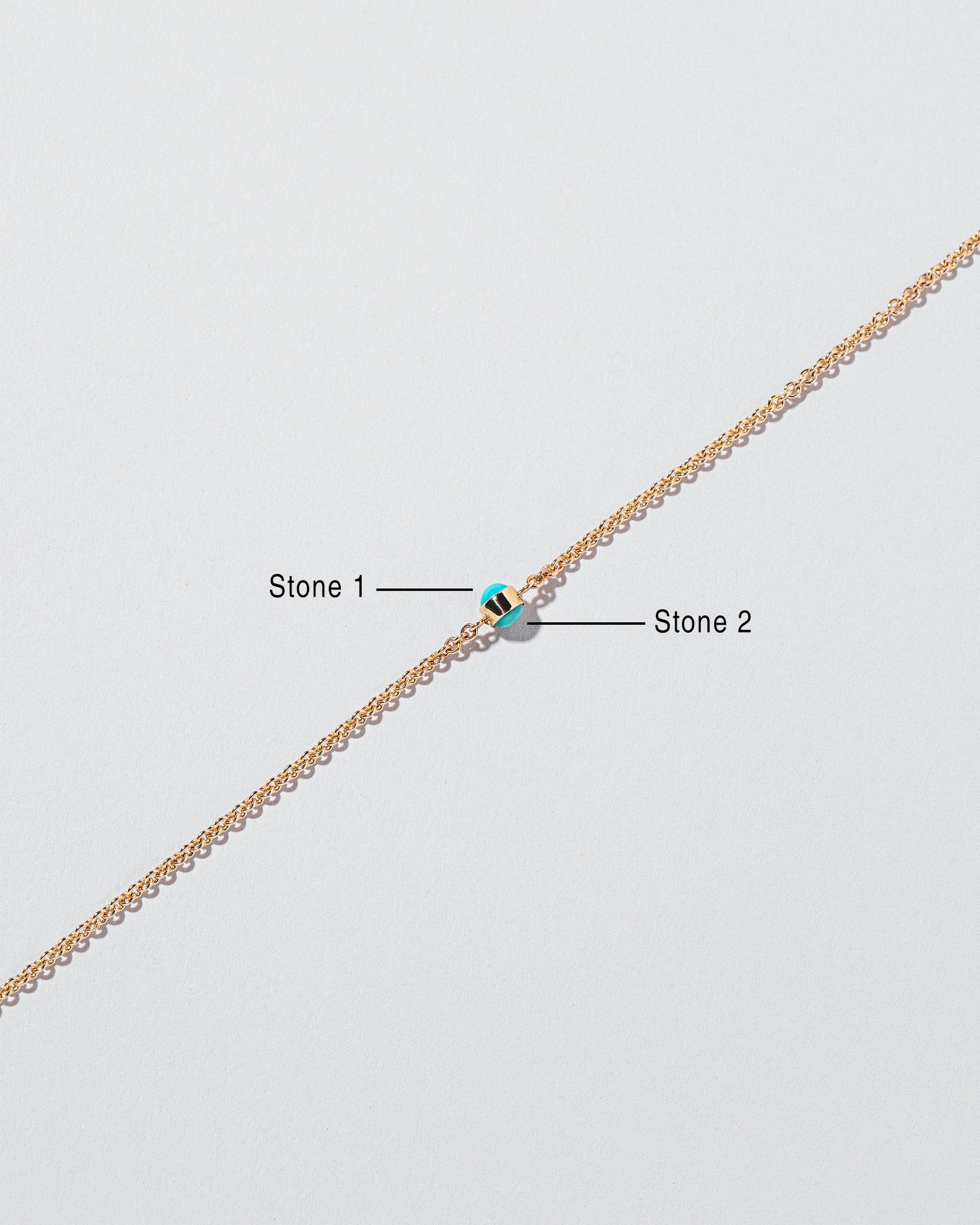 Birthstone Bracelet - One Bezel on light color background.
