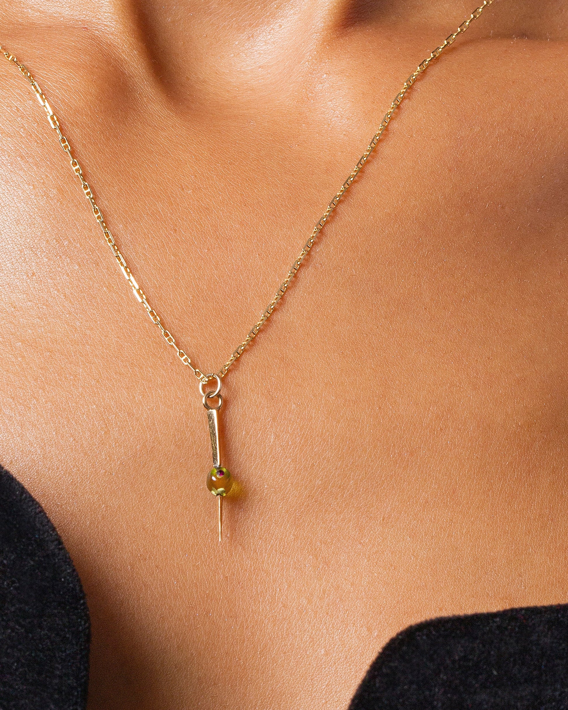 Martini Olive Charm on model.