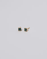 Square Stud - Teal Tourmaline on light color background.