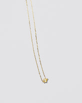 Be Good Necklace on light color background.