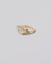 Okama Ring on light color background.