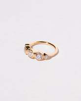 Lyra Ring on light color background.