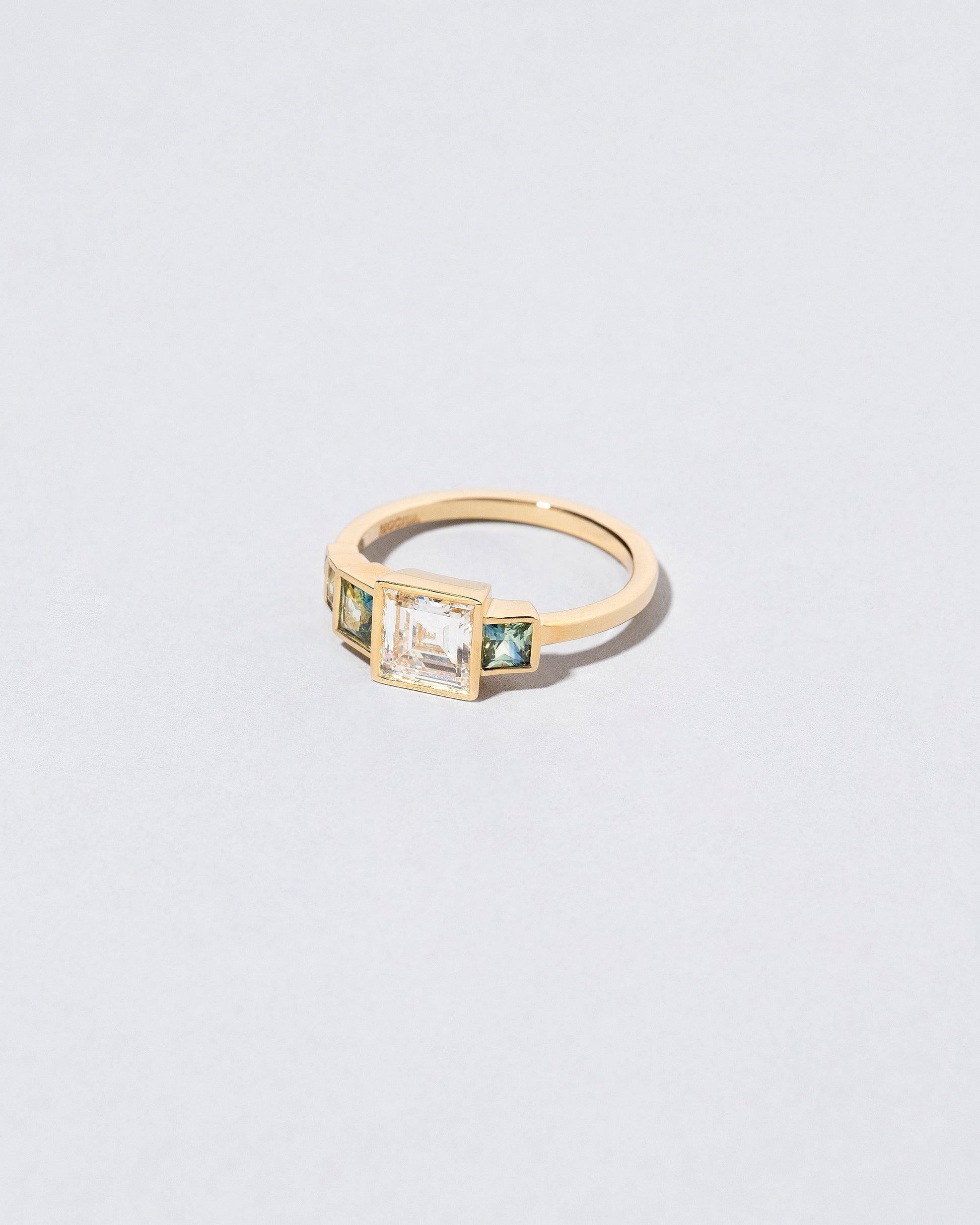 Truthmaker Ring on light color background.