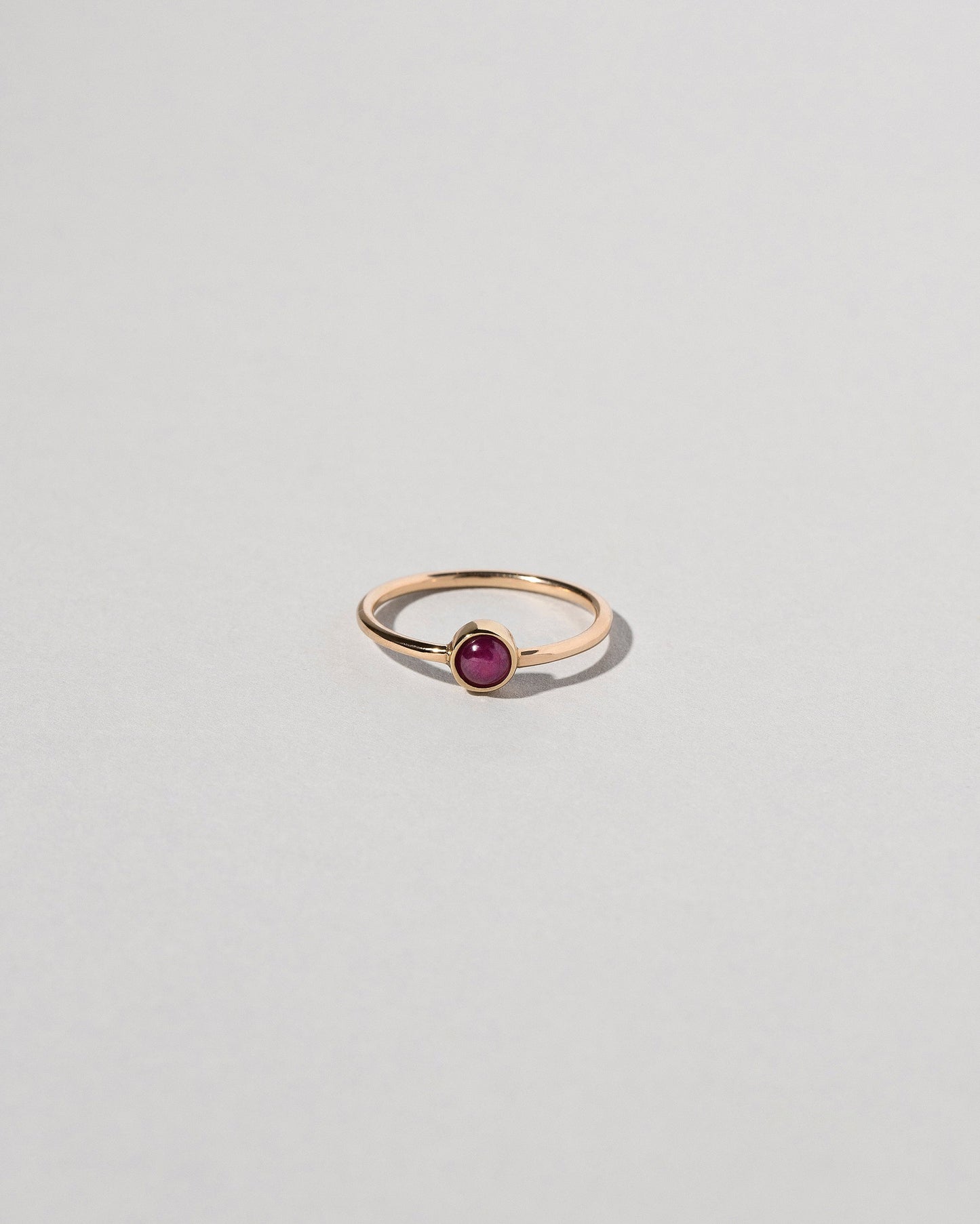Birthstone Ring on light color background.