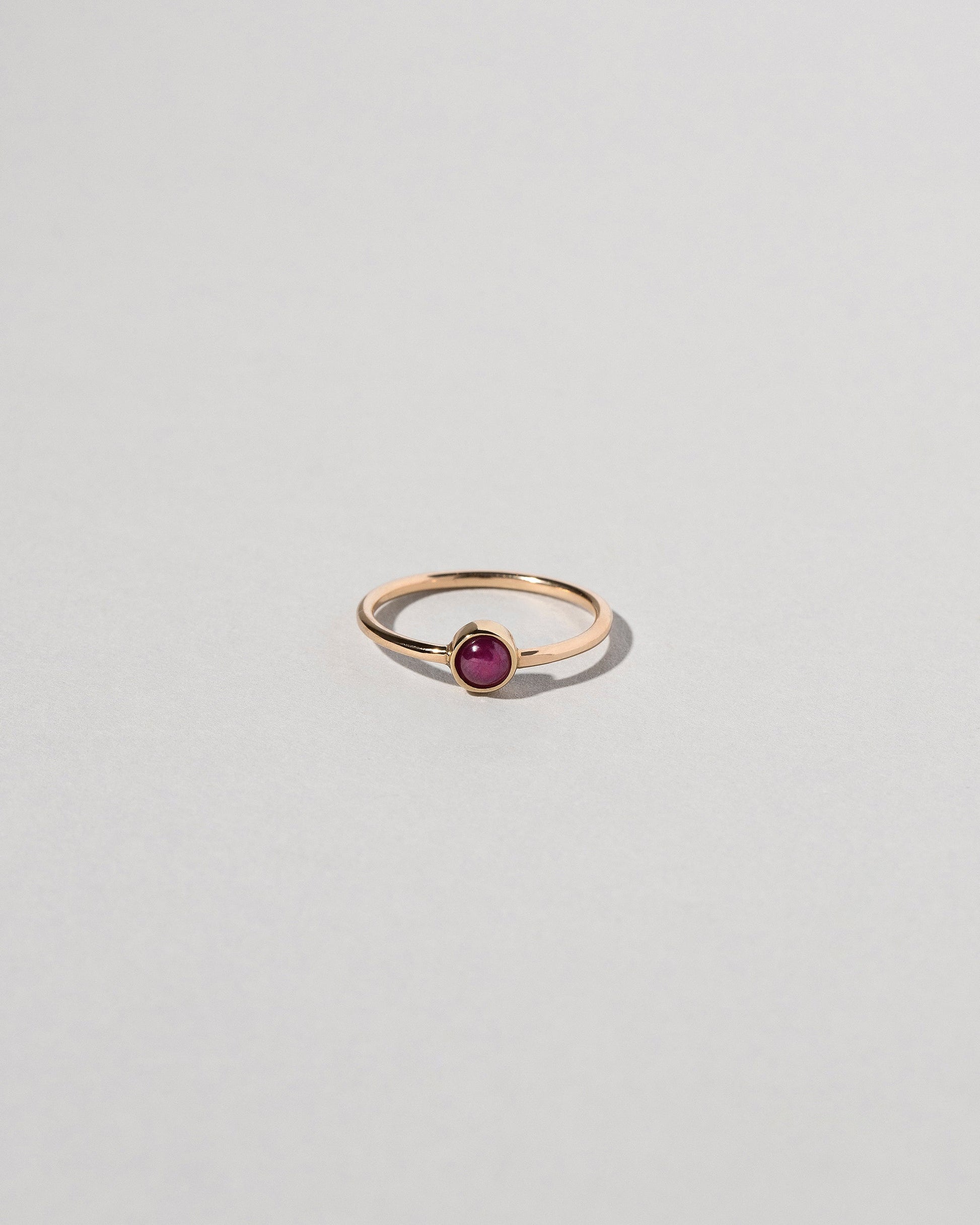 Birthstone Ring on light color background.