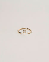 Stacked Ring - White Diamond on light color background.