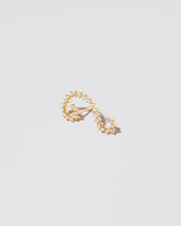 Left White Diamond Symbol of Change Earring Single on light color background.