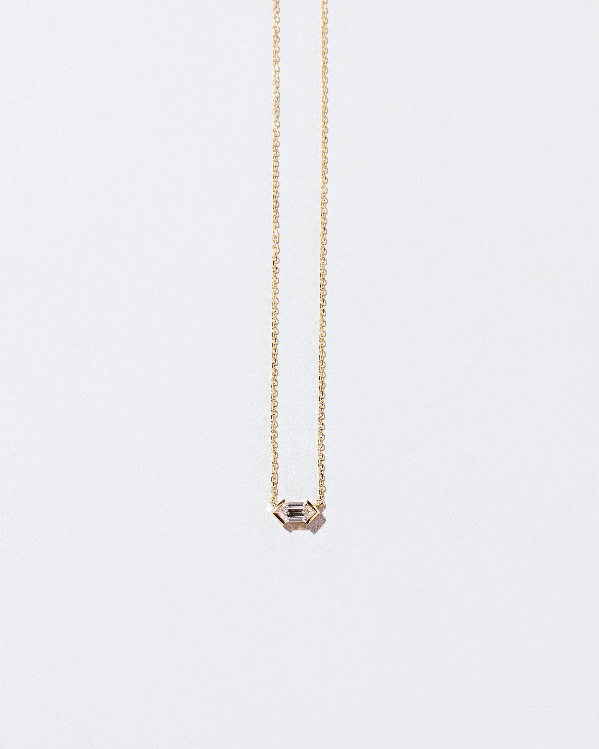 Saltwhistle Necklace on light color background.