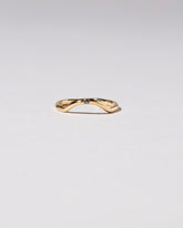  Mini Curve Band - Single Stone on light color background.