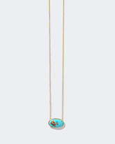 Tranquility Necklace on light color background.