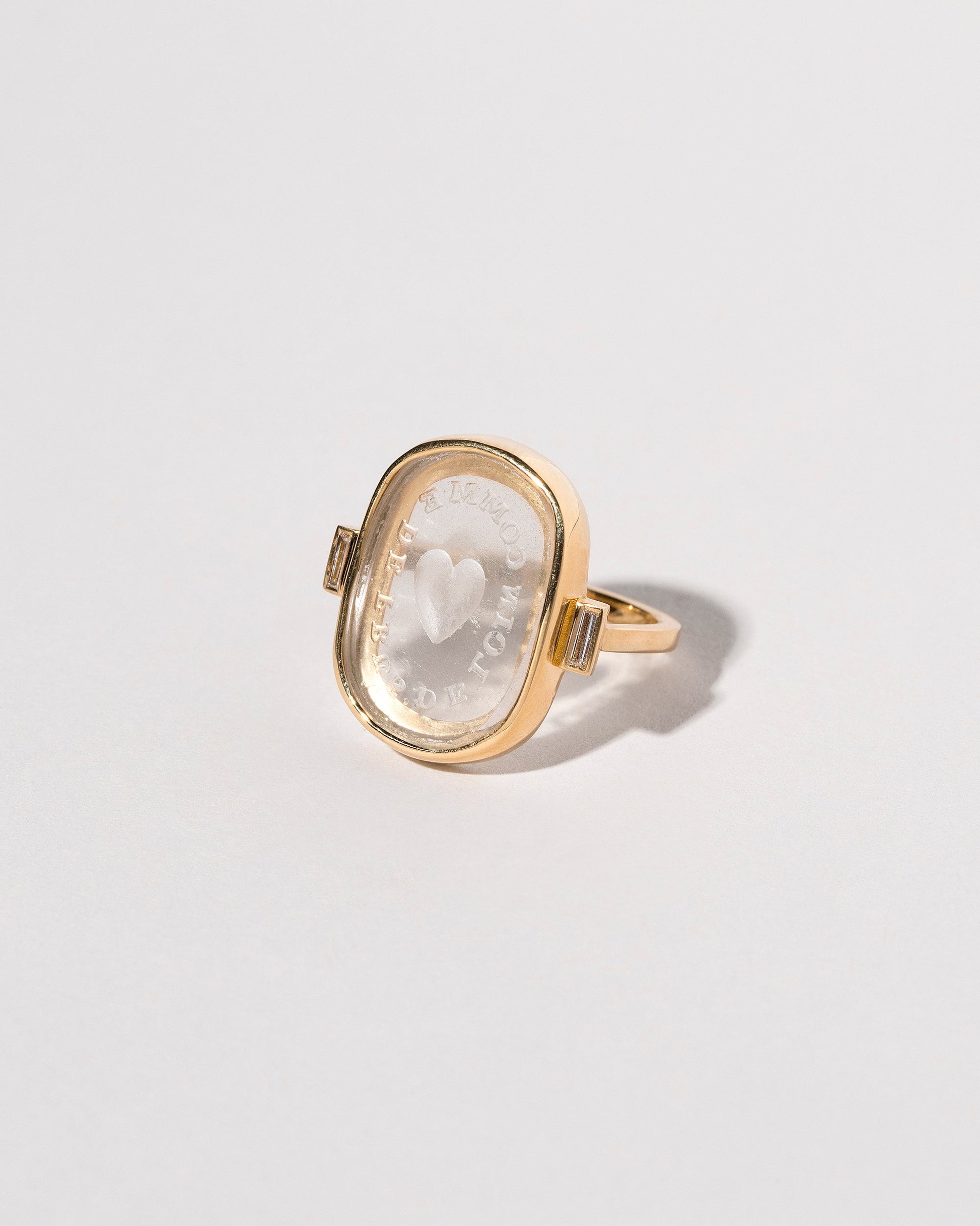 View from the side of the Long Distance Intaglio Seal Ring on light color background.