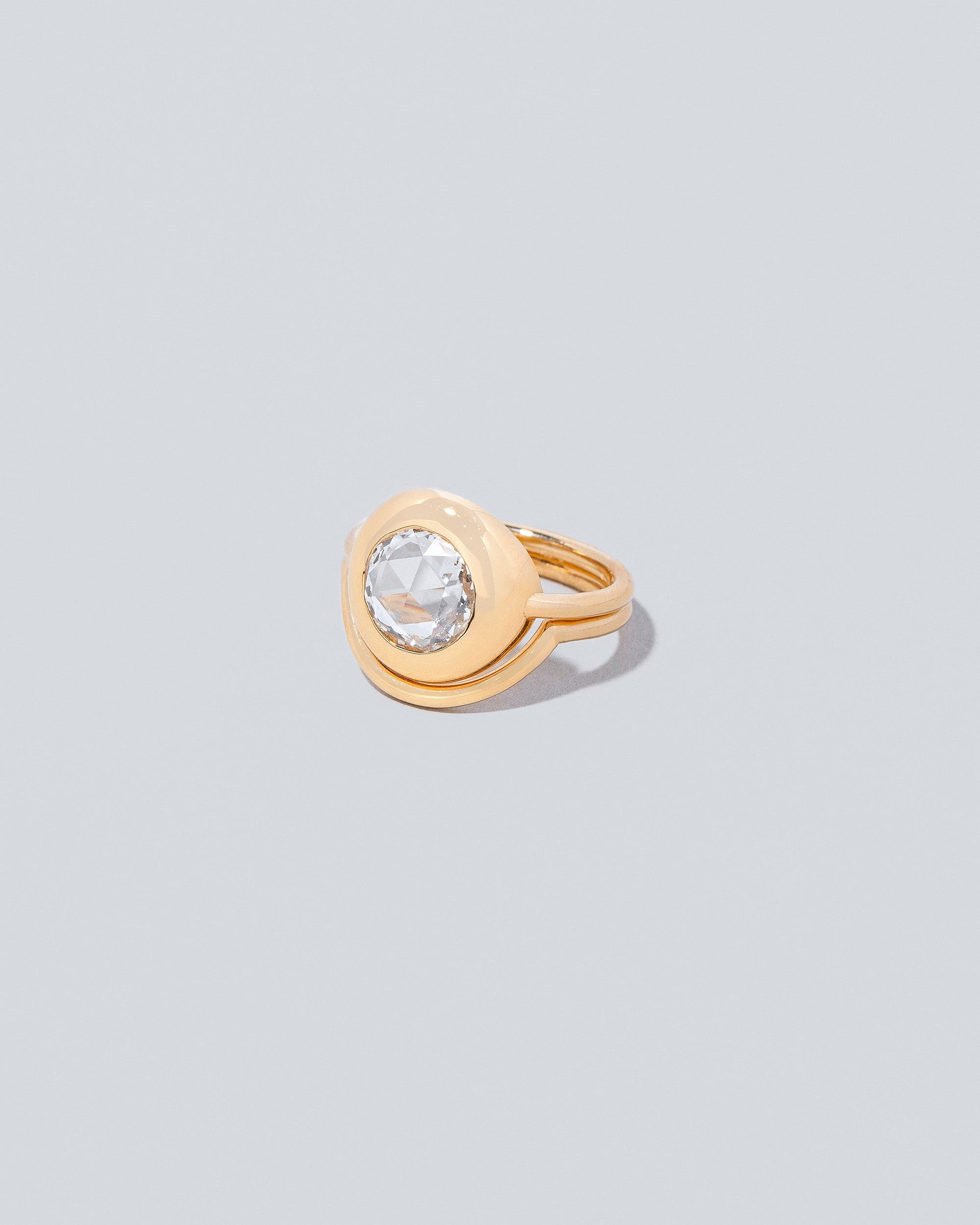 Left side view of Grand Exposition Ring with Exposition Band on light color background.