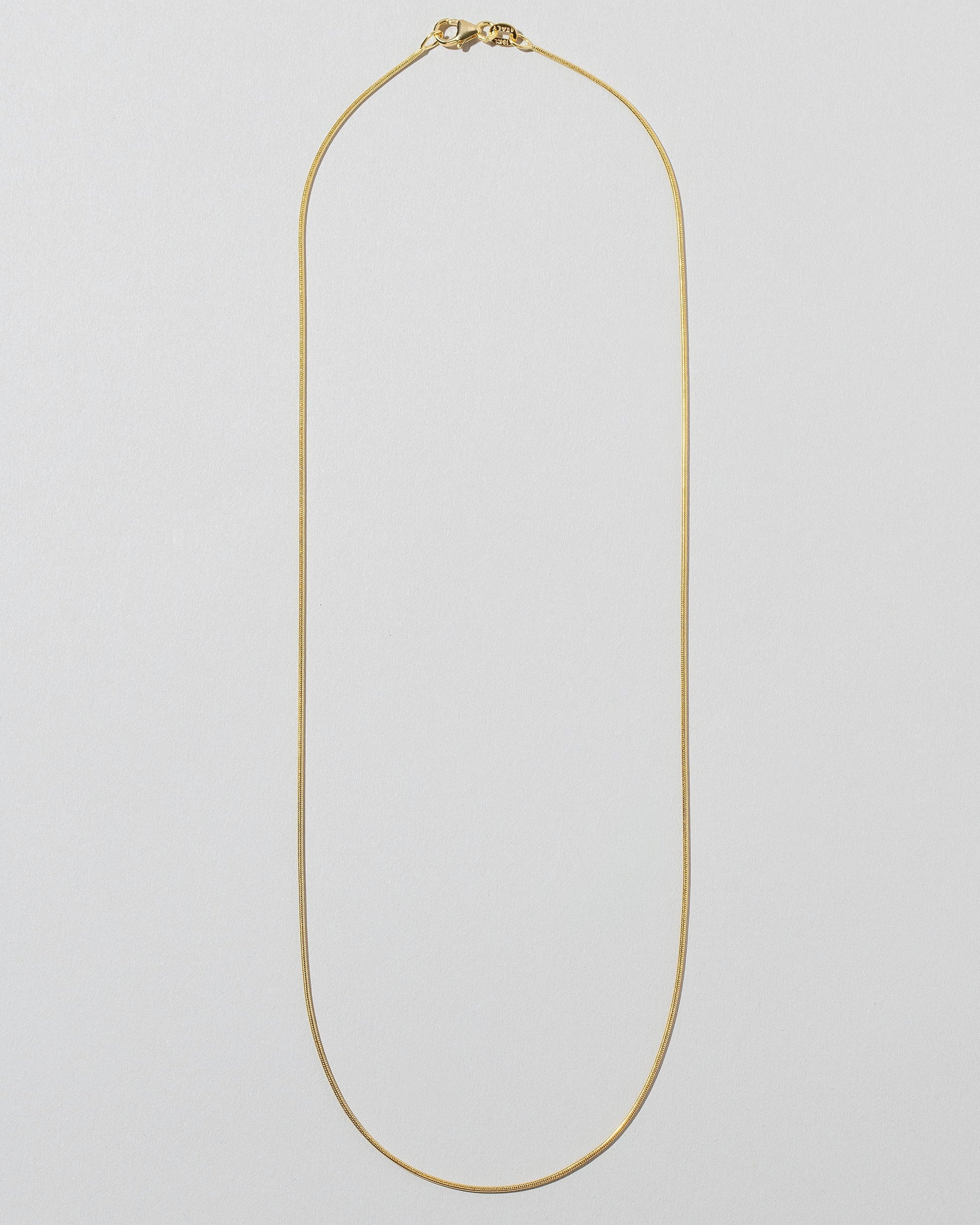 0.9mm Serpent Chain Necklace on light color background.