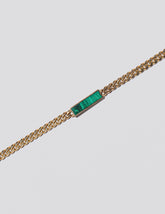 Identity Chain Necklace on light colored background.