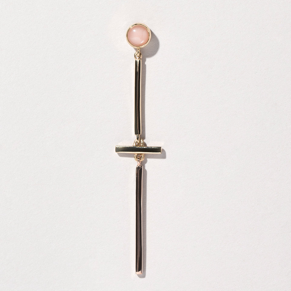 product_details:: Act 2. Single Earring 3 on light color background.