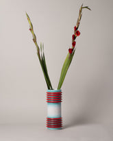 Styled image of Mazzotti 1903 Motorato Assolutoo Vase on light colored background.
