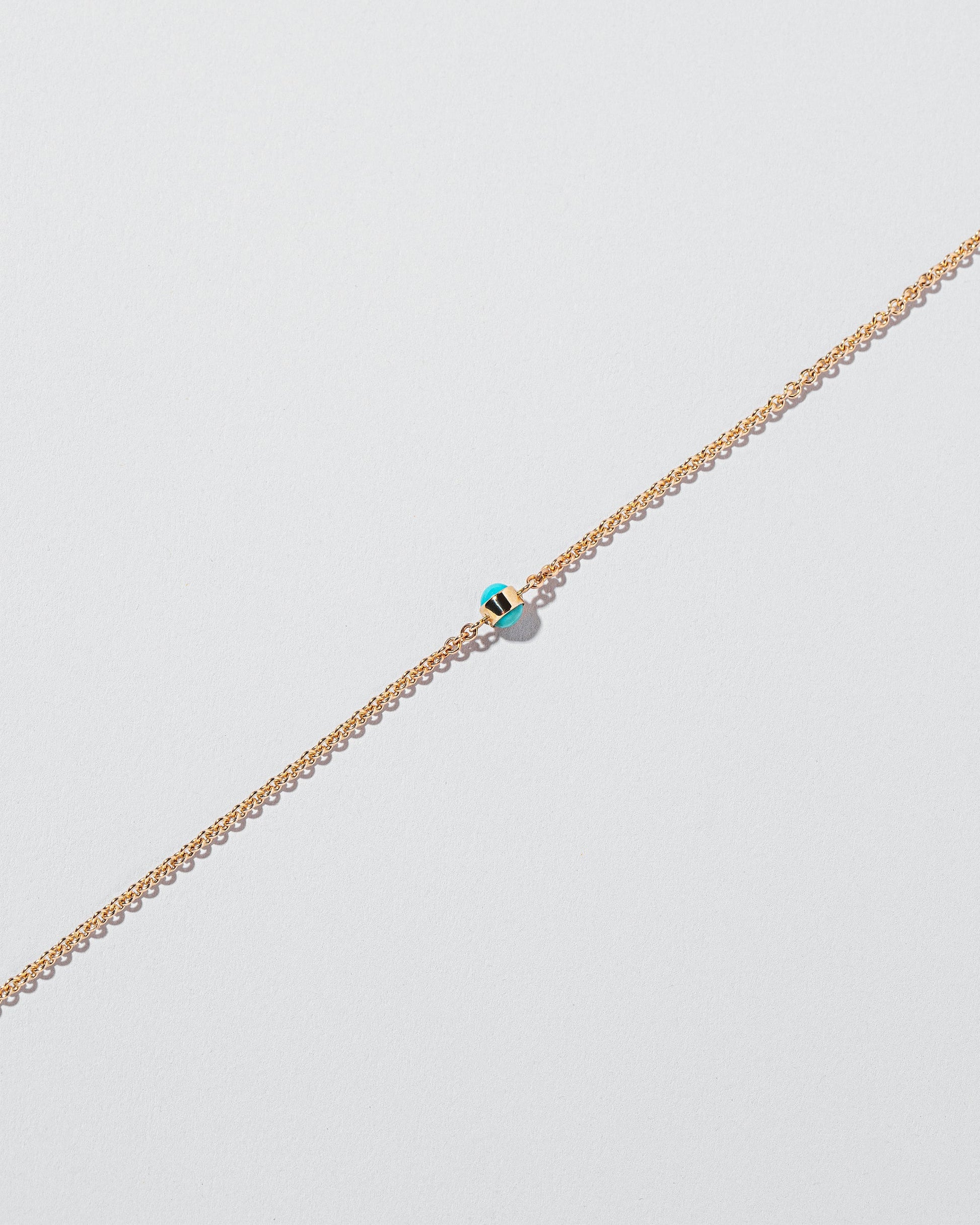Birthstone Bracelet - One Bezel on light color background.