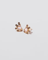 Comparison Earrings on light color background.
