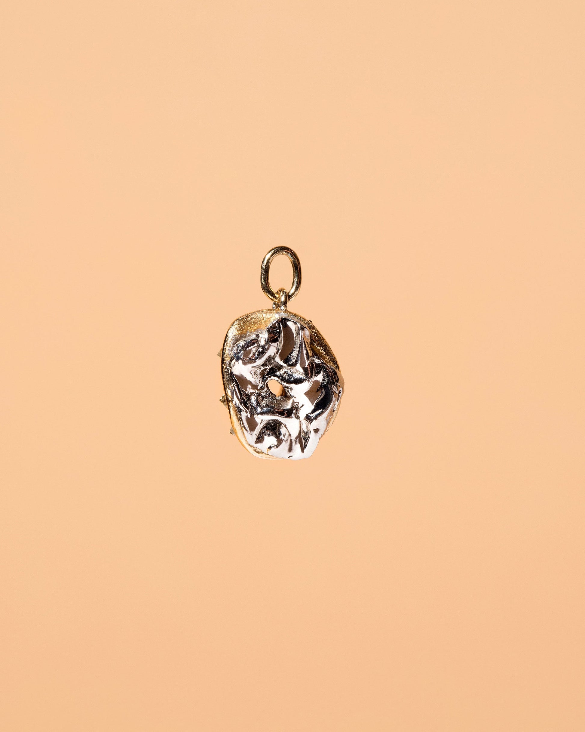 Salt Bagel Charm with Cream Cheese - Final Sale on light color background.