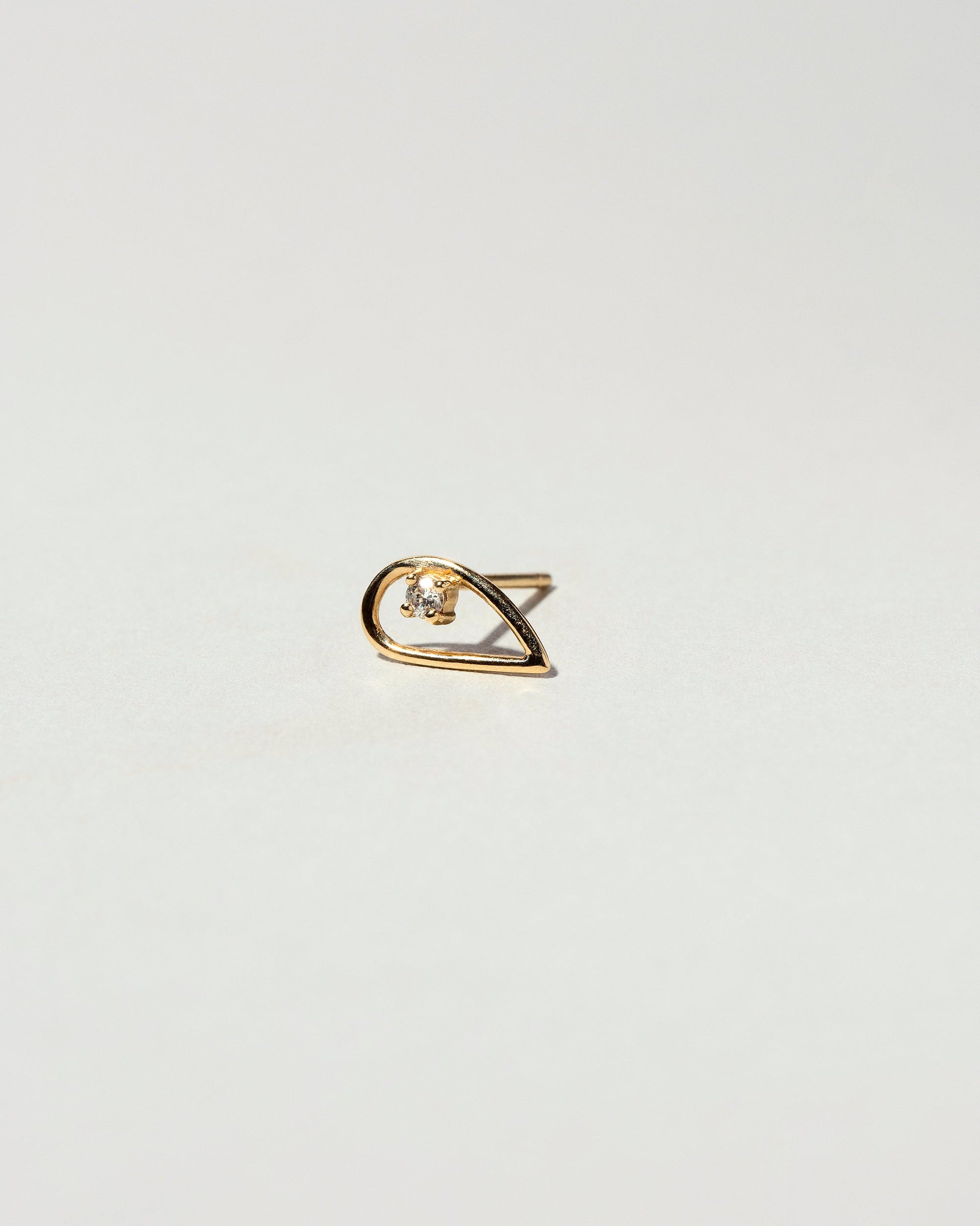 Sun Drop Single Stud on light color background.