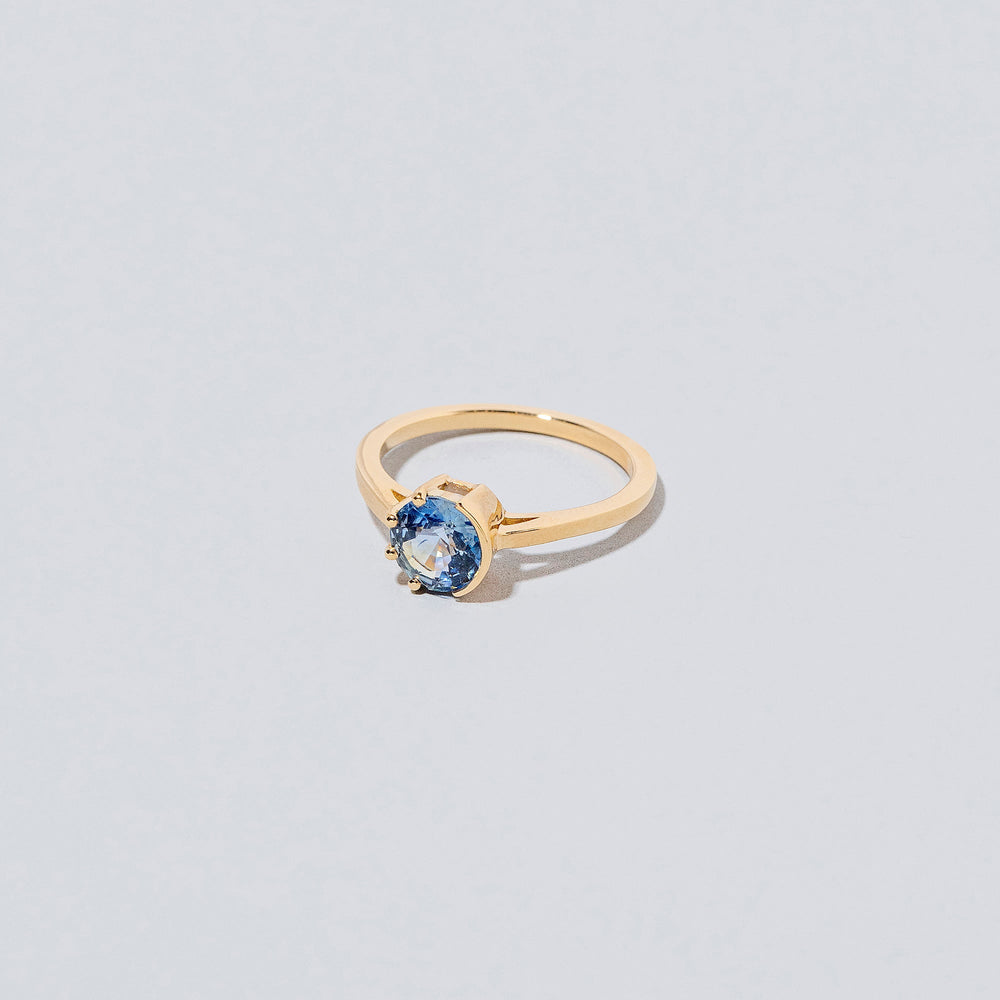 product_details::Sun & Moon Ring - Bicolor Sapphire on light color background.