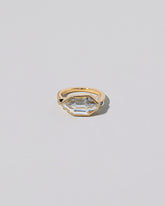 Okama Ring on light color background.