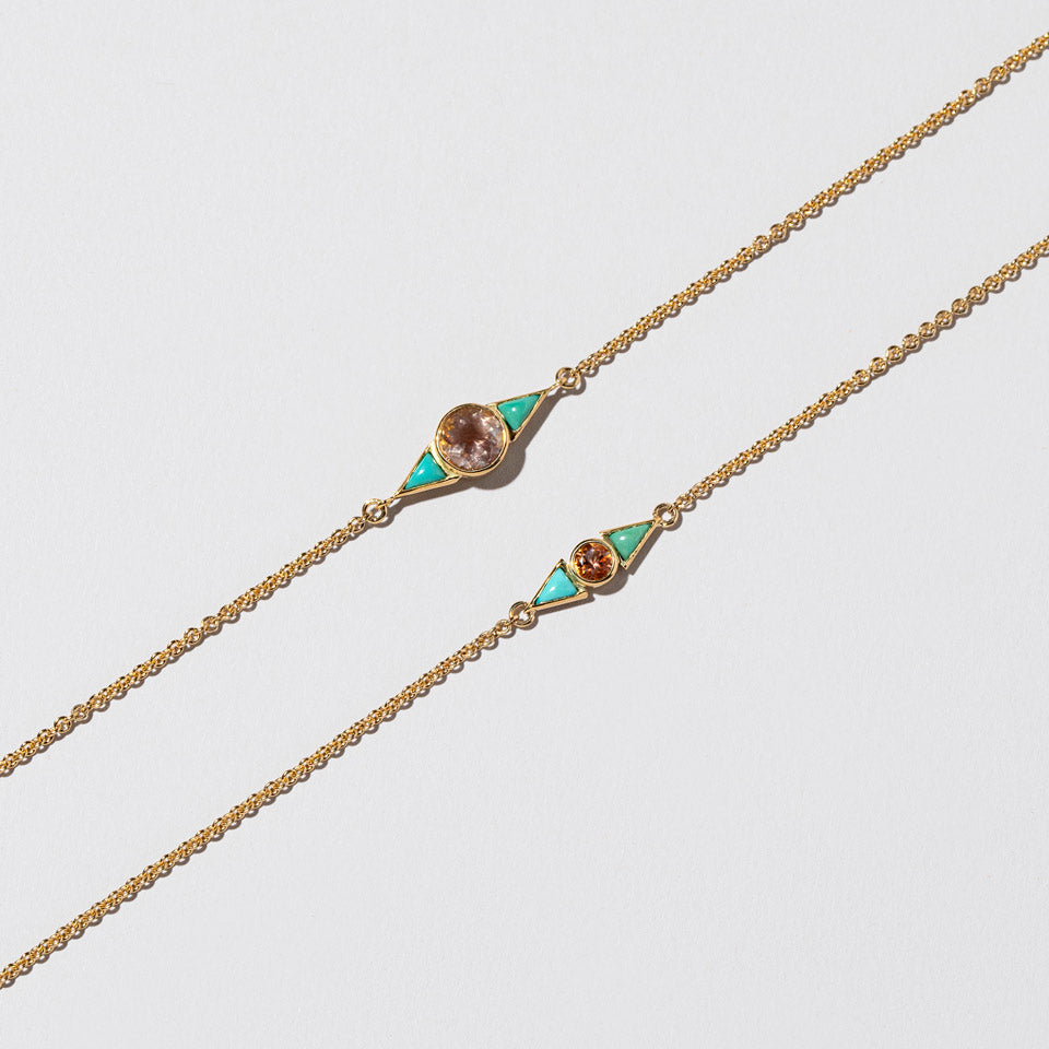 product_details:: Sunstone & Turquoise Eye Bracelet on light color background.