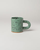 Recreation Center Dalmation Jasper Mandy Mug on light color background.