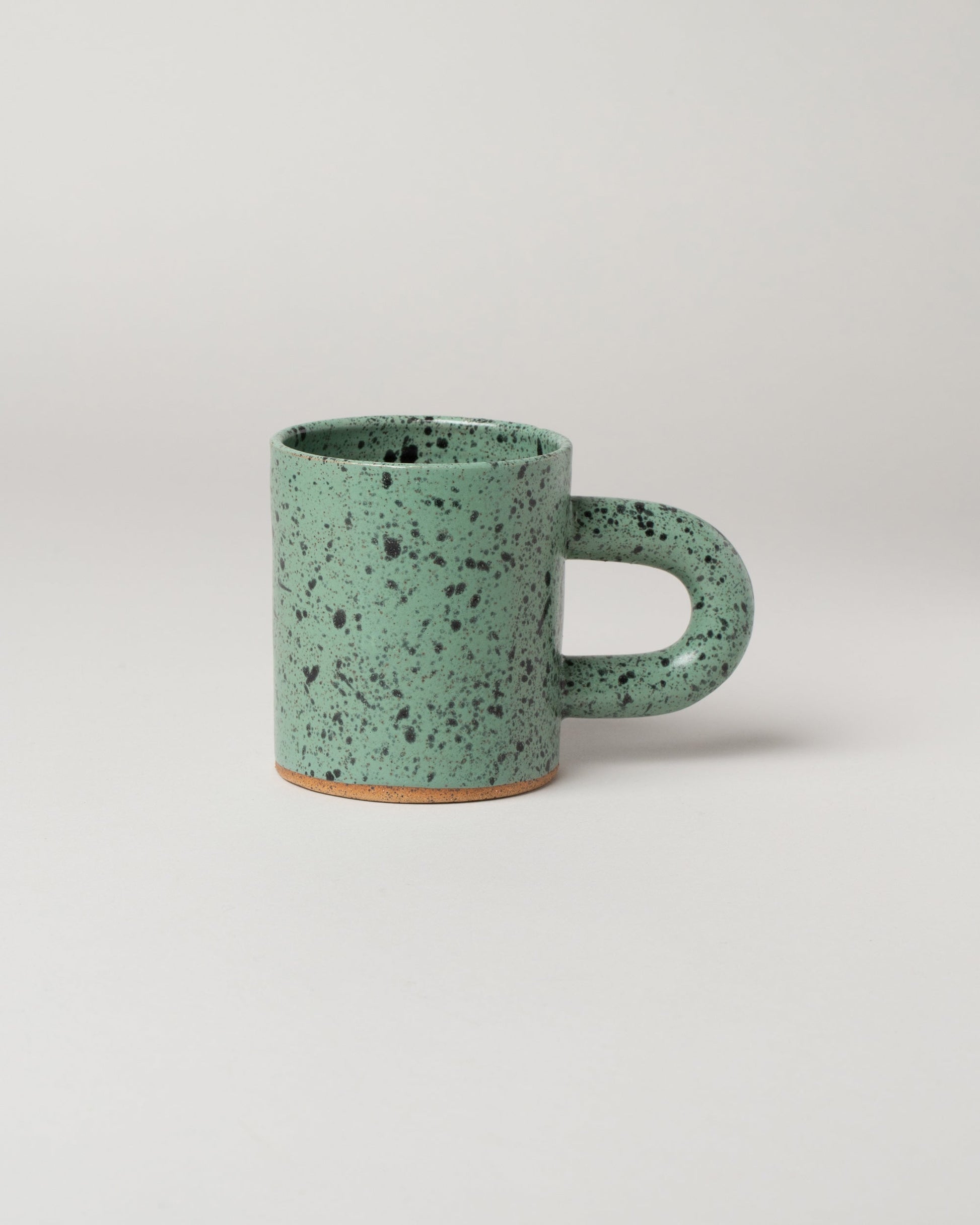 Recreation Center Dalmation Jasper Mandy Mug on light color background.