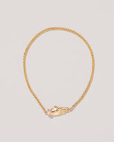 Manifestation Bracelet on light color background.