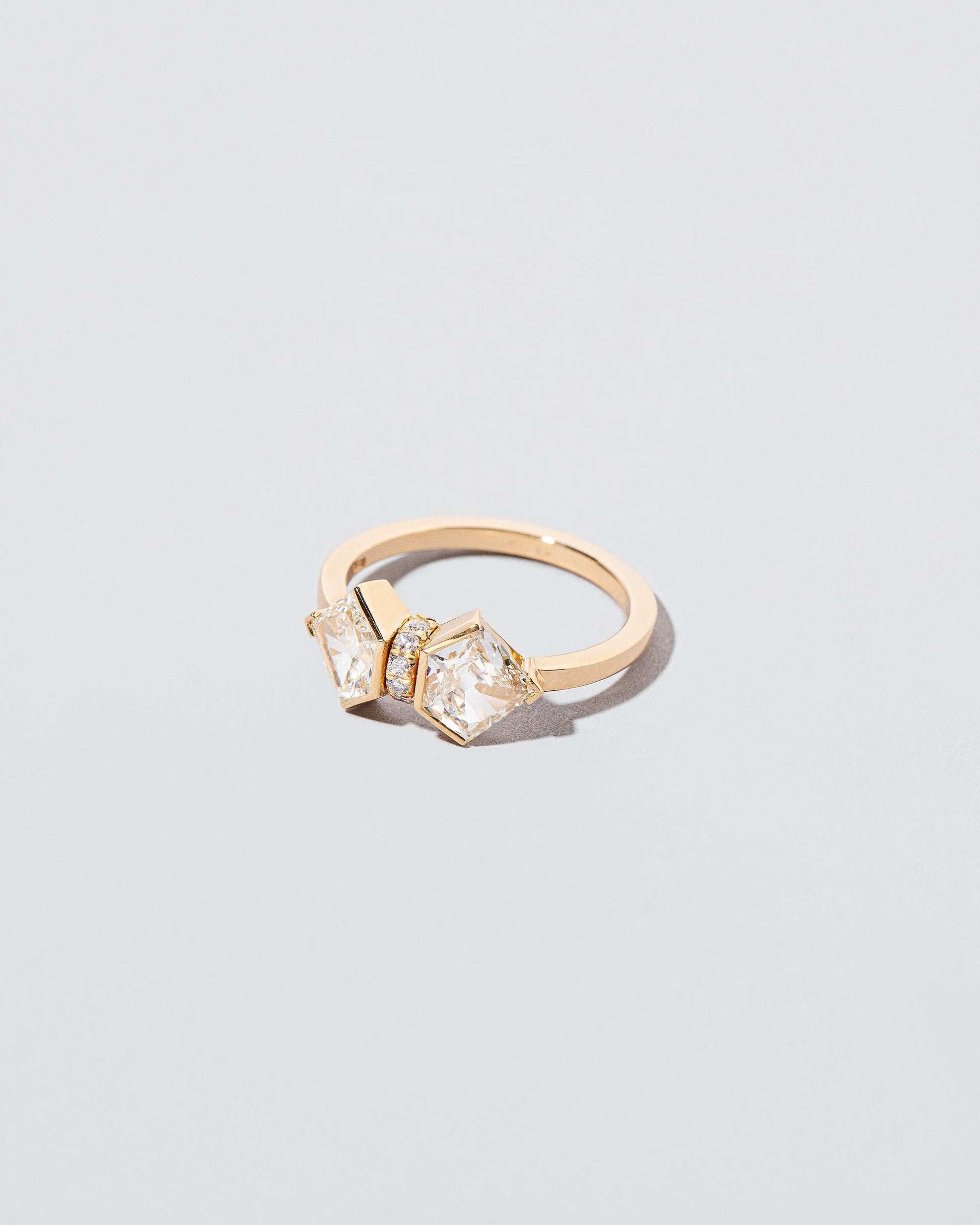 Alchemy Ring on light color background.