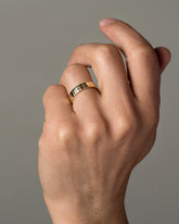 Gold 5mm Etched Lines Band on model.