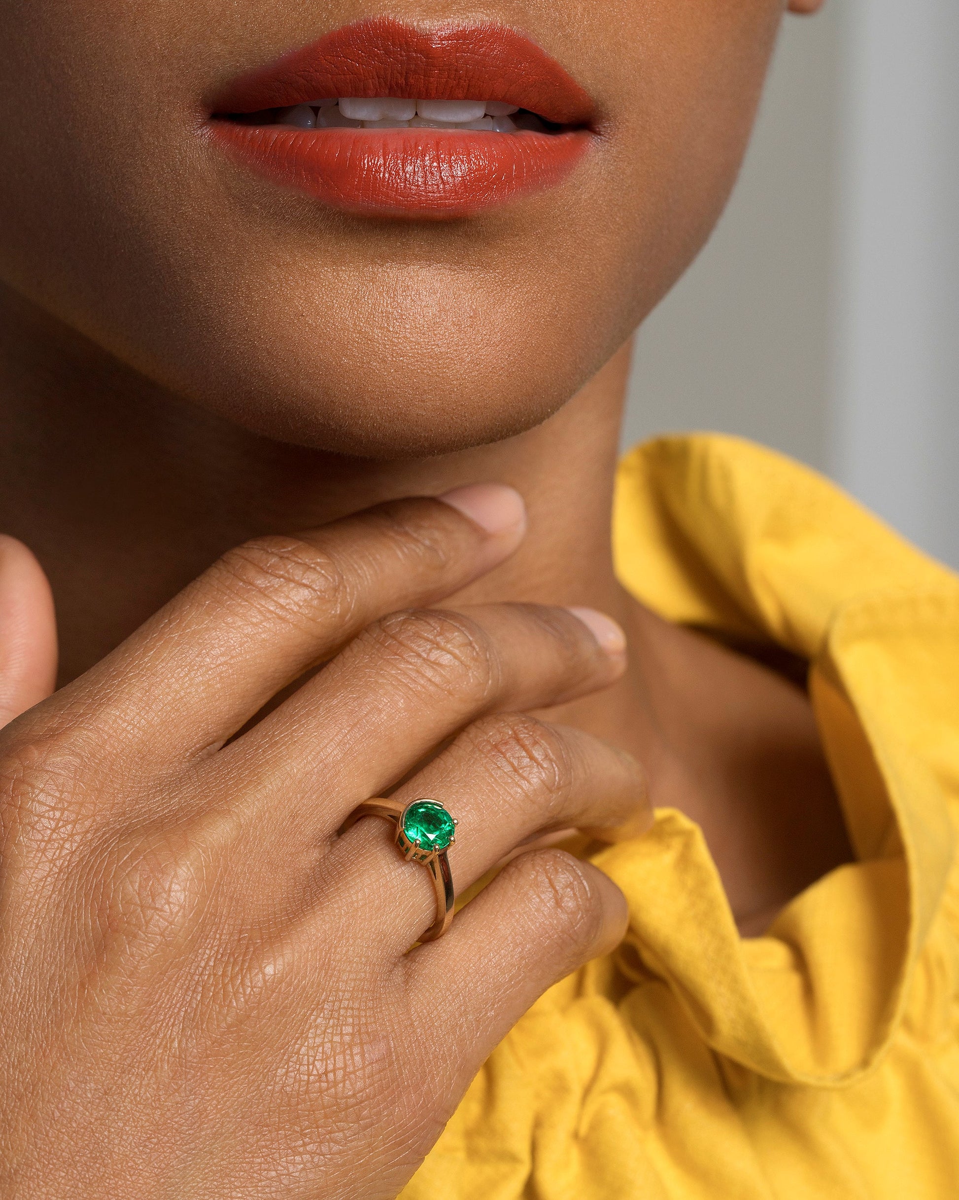 Sun & Moon Ring - Emerald on model.