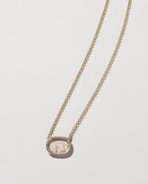 Independence Intaglio Seal Necklace on light color background.