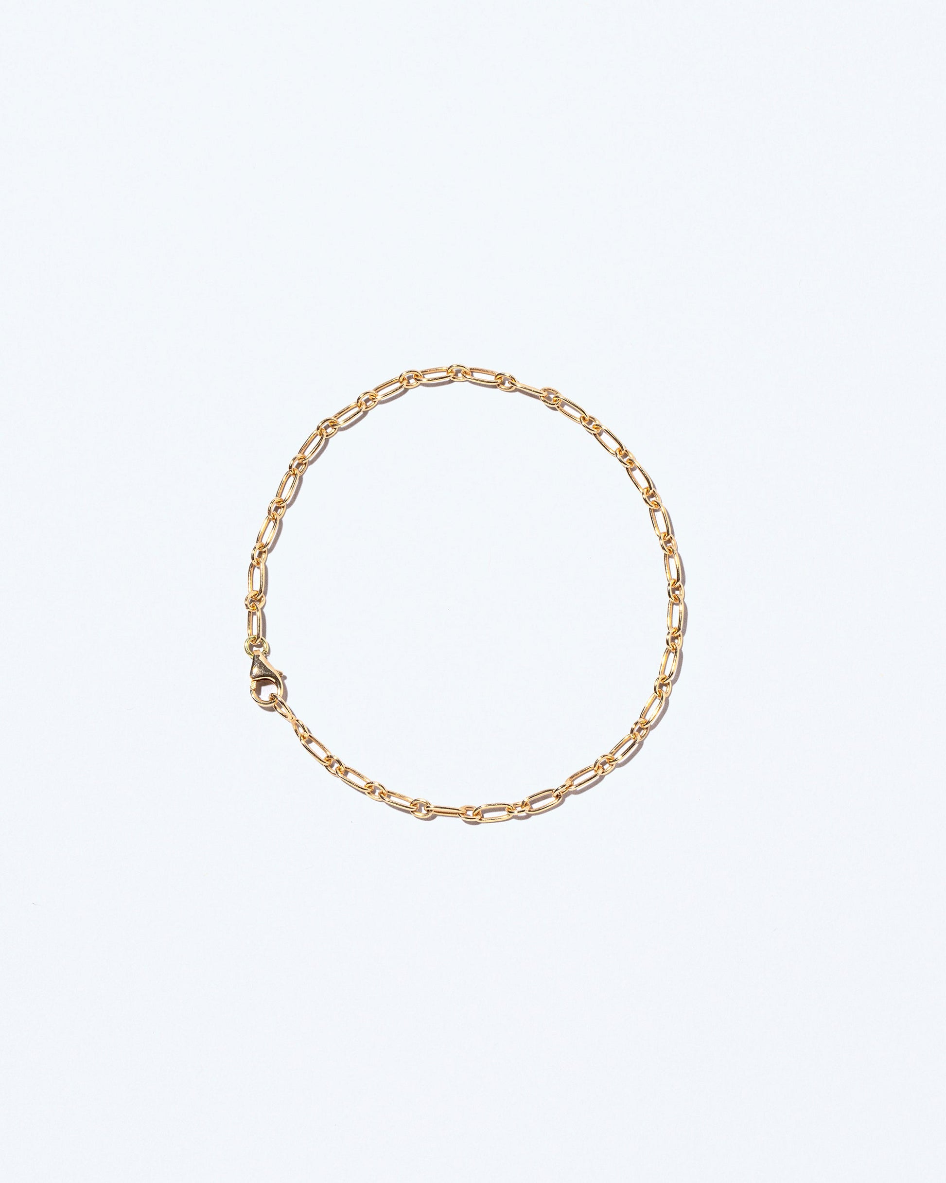 Hotdog Chain Bracelet on light color background.