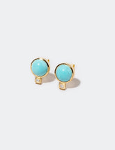Sky Earrings on light color background.