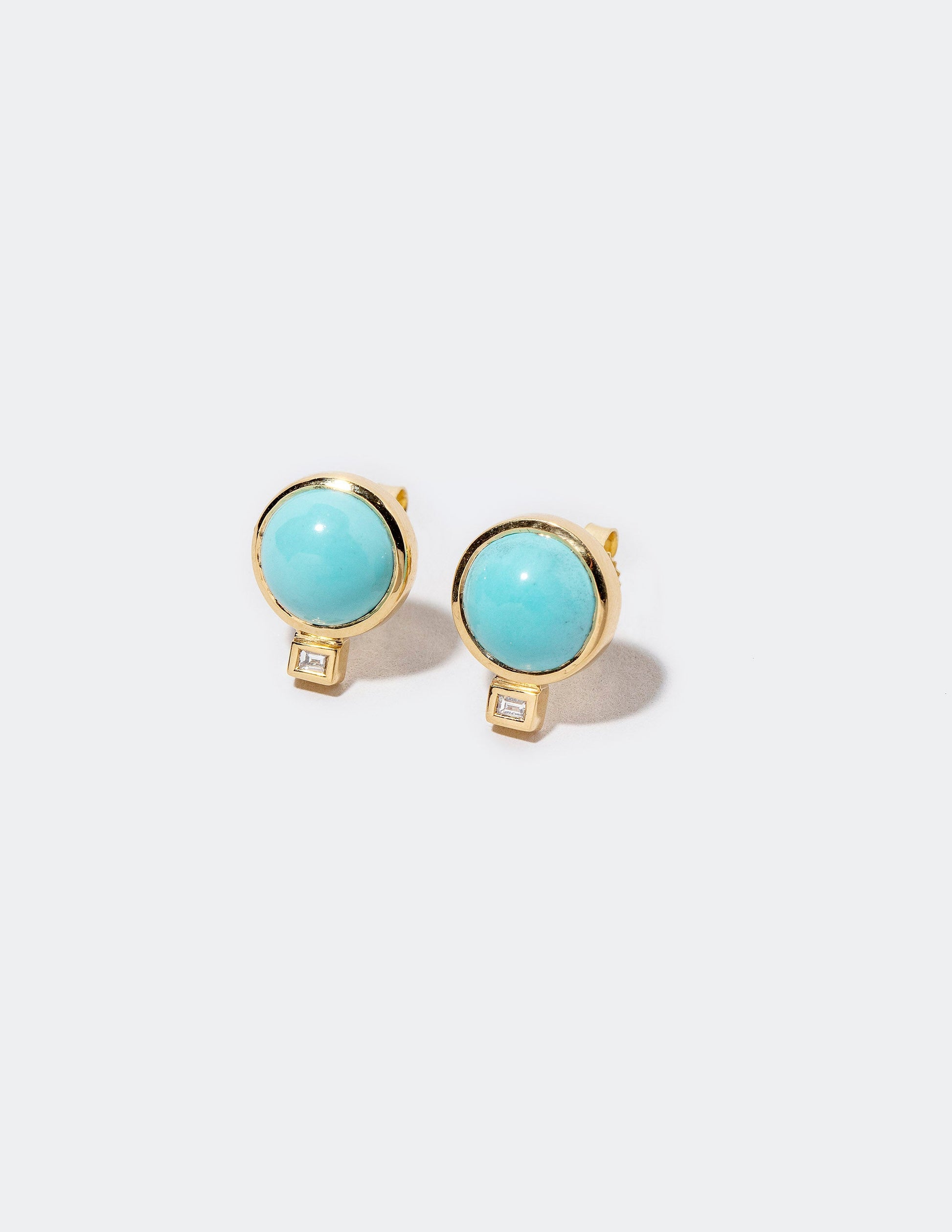Sky Earrings on light color background.