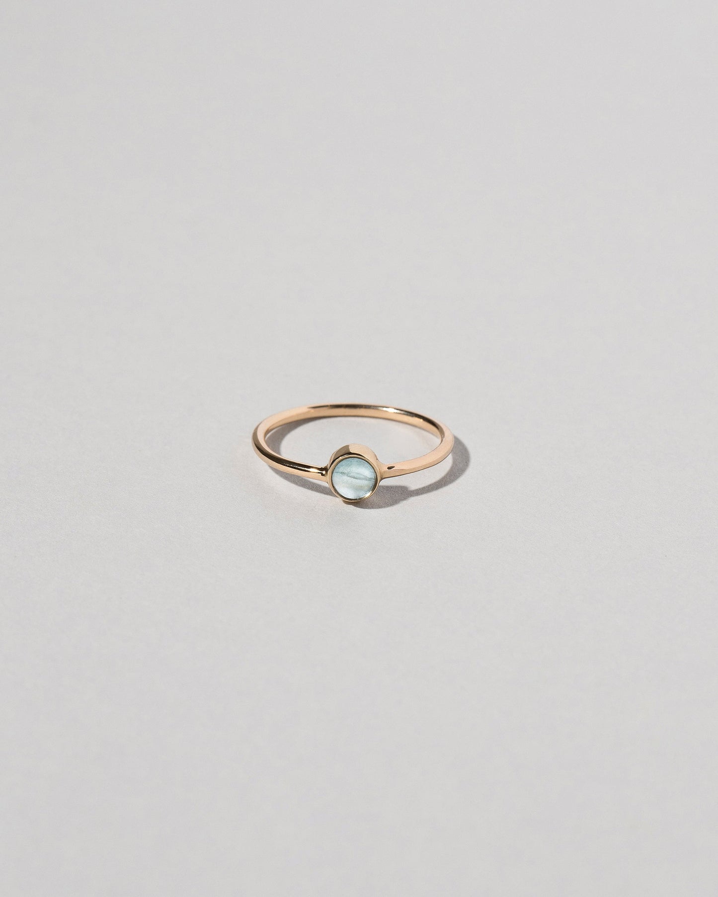 Birthstone Ring on light color background.