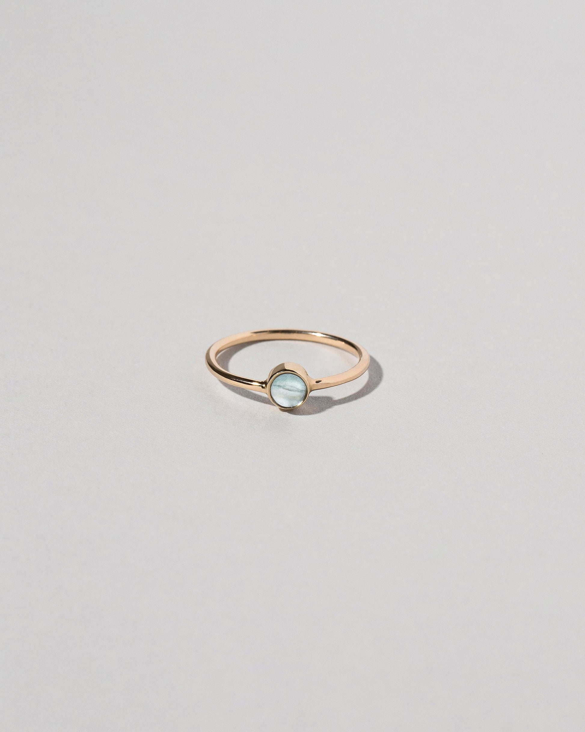 Birthstone Ring on light color background.