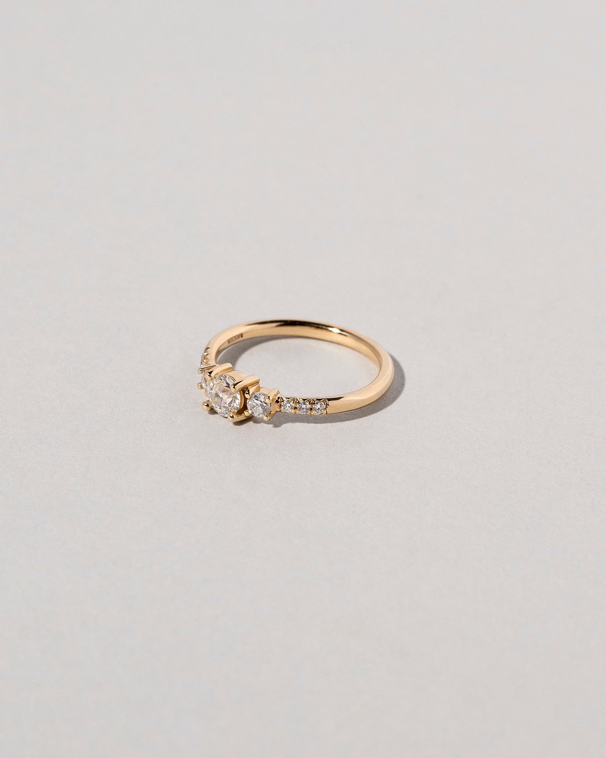 Patira Ring - White Diamond on light color background.