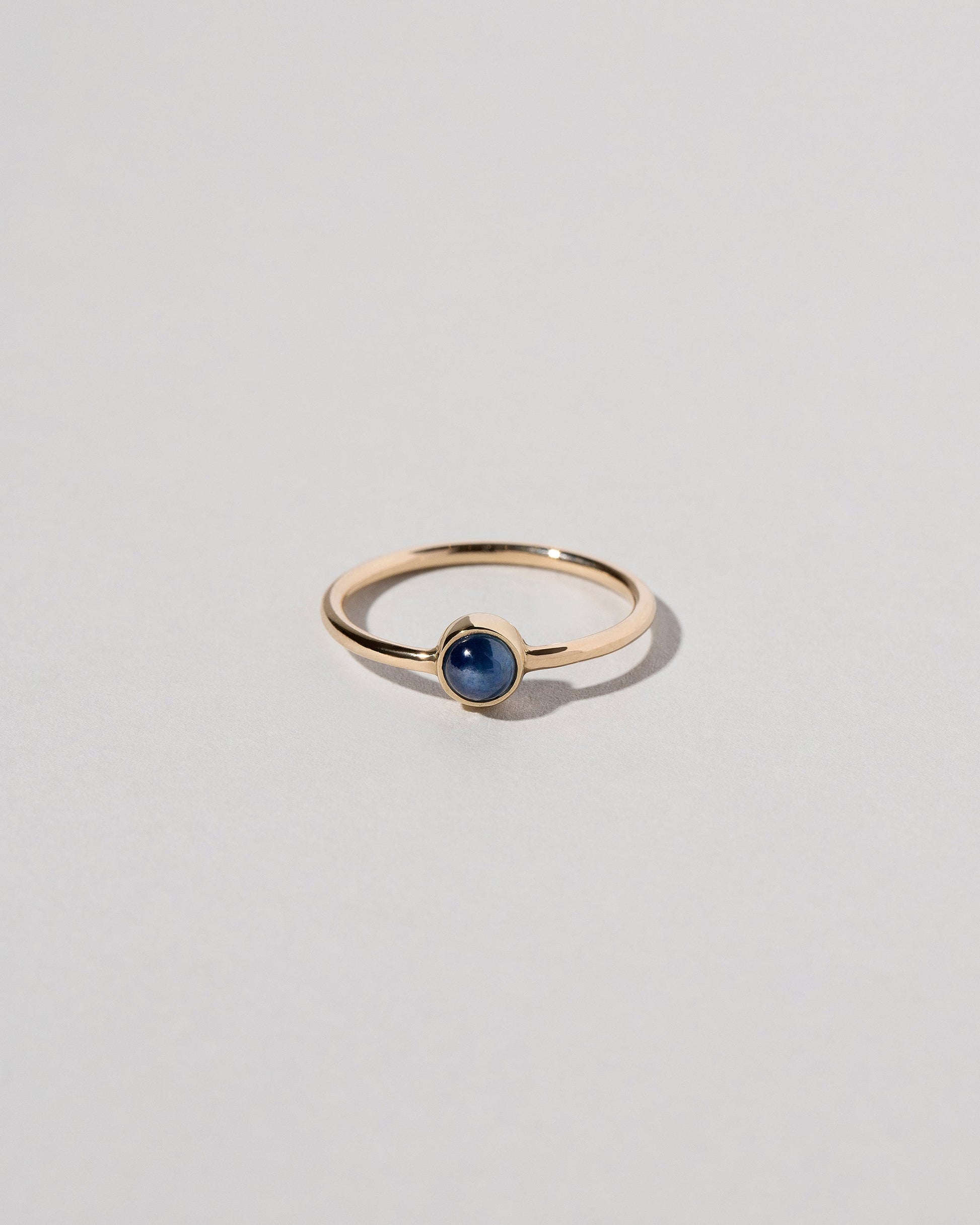Birthstone Ring on light color background.