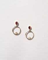 Act 2. Earrings 6 on light color background.