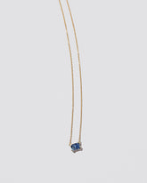 All Mine Necklace on light color background.