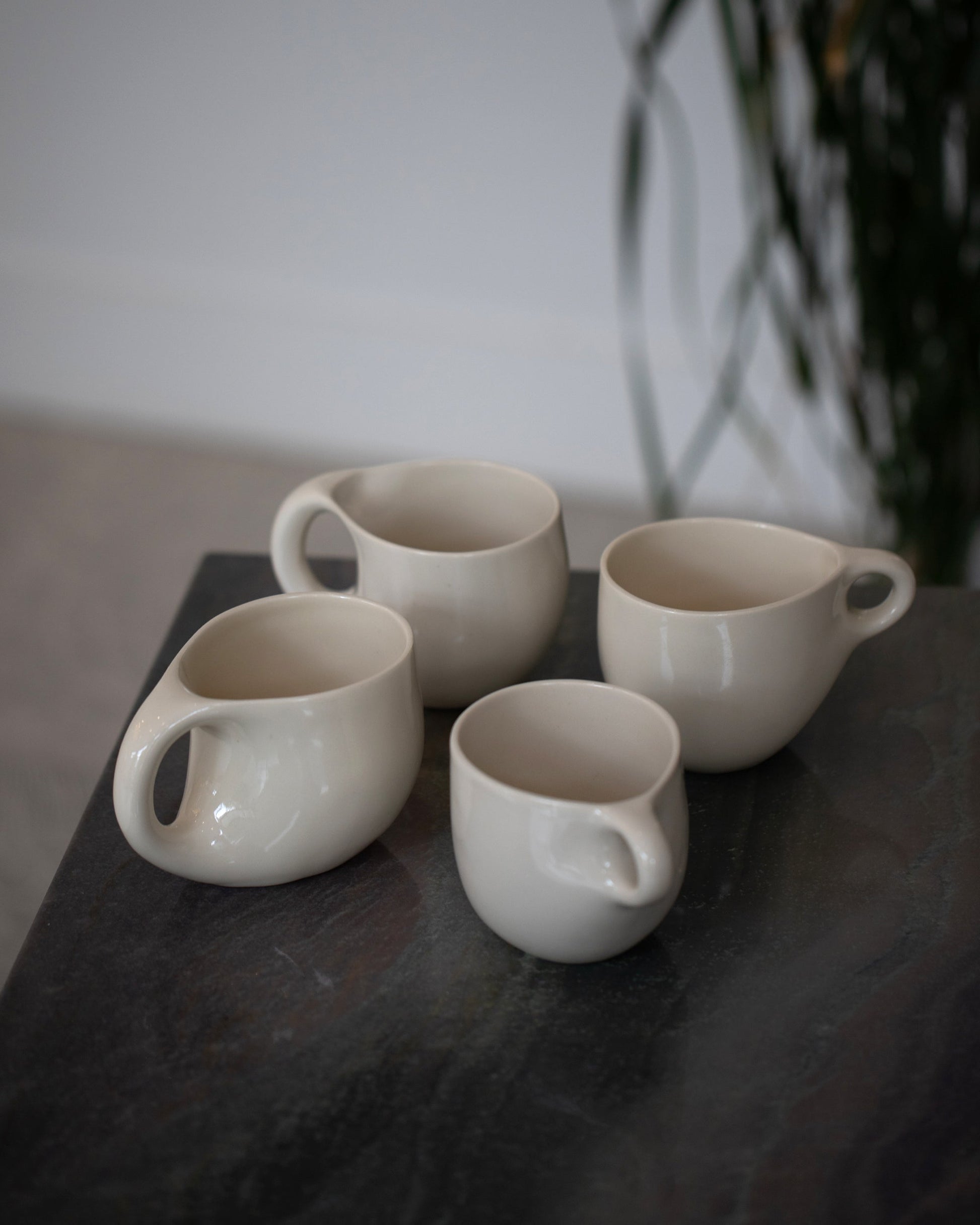 Styled image featuring Dust and Form Comfort Mugs and Ritual Mugs.