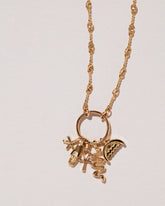 Friendship Necklace on light color background.