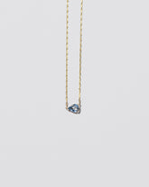Say Yes Necklace on light color background.