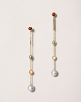 Act 2. Earrings 1 on light color background.