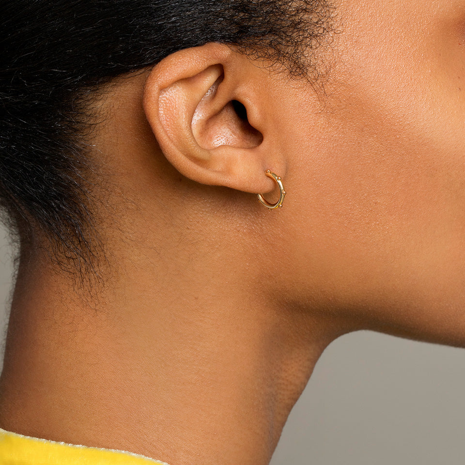 product_details::Abacus Hoop Earrings on model.