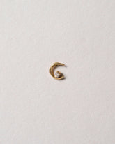 Right White Diamond Moon Ray Stud Earring Single on light color background.