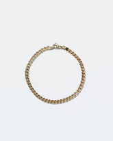  Curb Chain Bracelet on light color background.